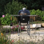 Black Saffire charcoal grill and smoker with stainless steel cart