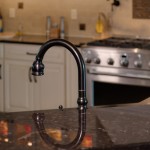 Black faucet in kitchen