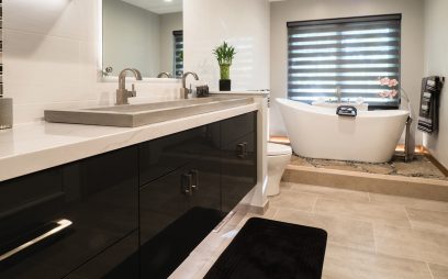 bathroom remodel with black contemporary vanity and quartz vanity countertops