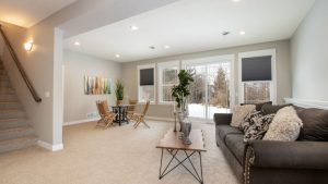 home design project with beige carpeting and furniture from benson stone co