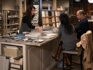 Kitchen and Bath Designers help pick out countertops and other items with customers
