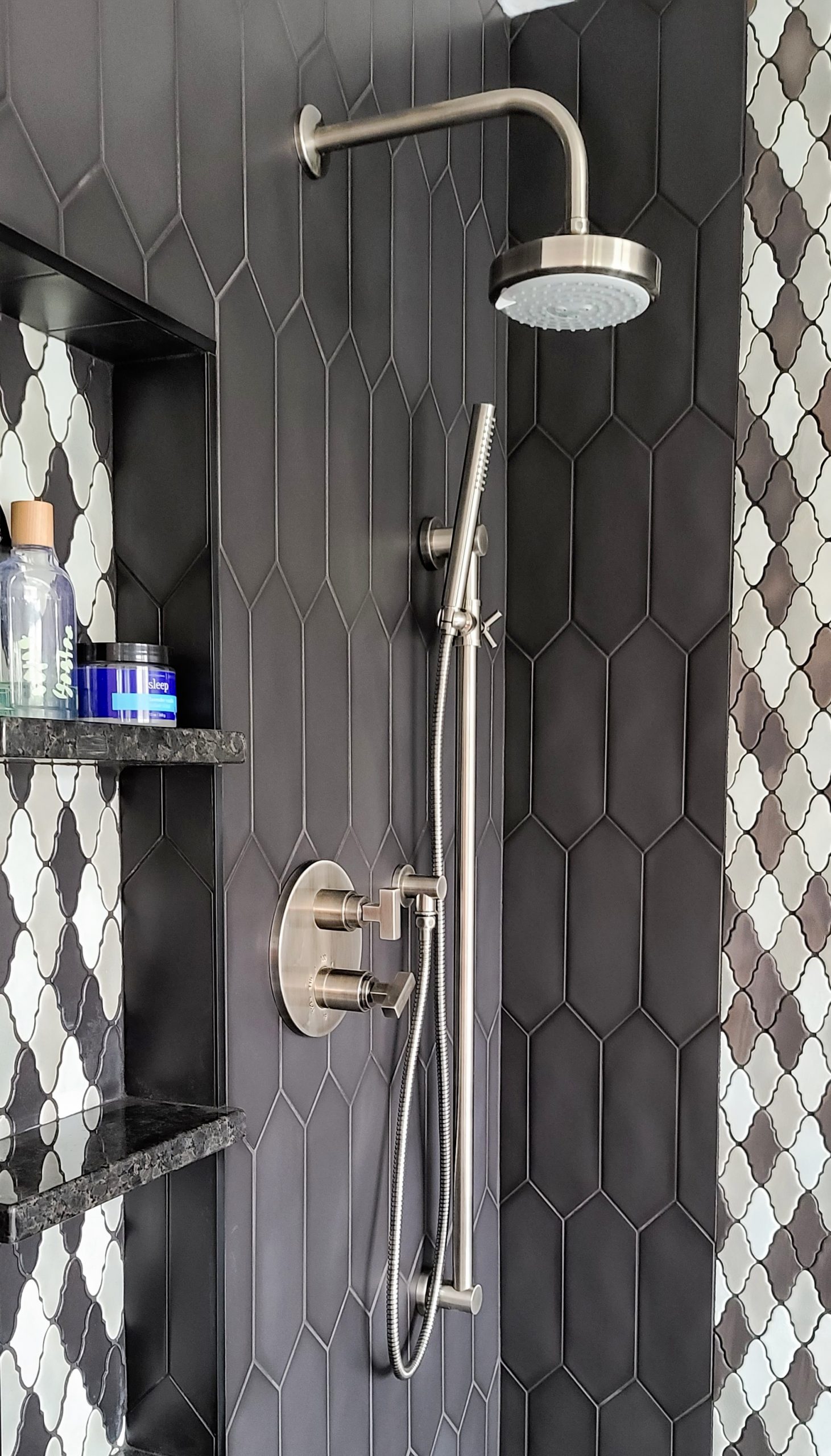 shower remodel with back and grey mosaic shower tile