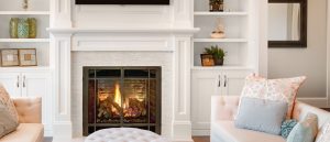 Fireplace design with white brick facing and mantel