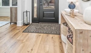 Light color wood-look luxury vinyl flooring in an entryway