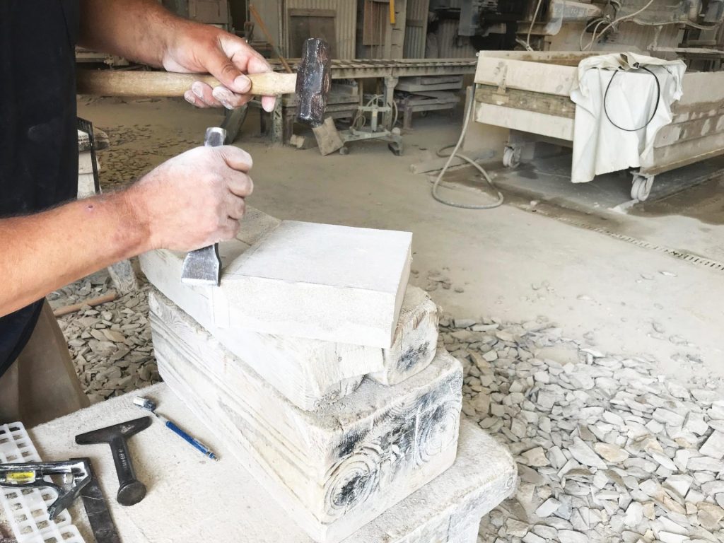 handcrafting limestone in the benson stone co cut stone shop
