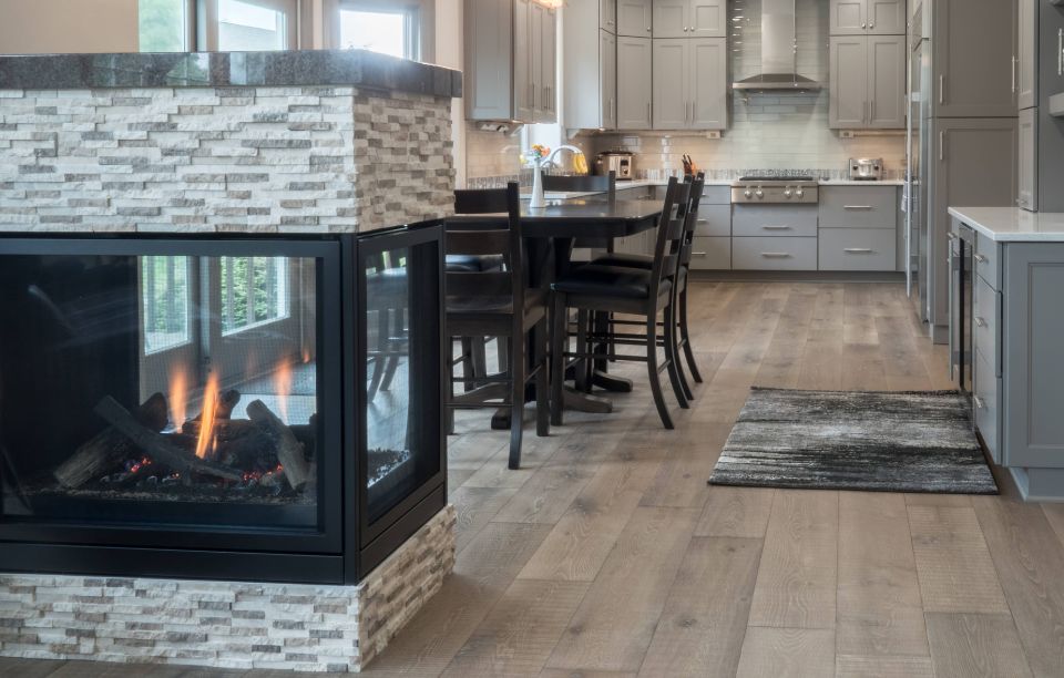 peninsula gas fireplace in a kitchen
