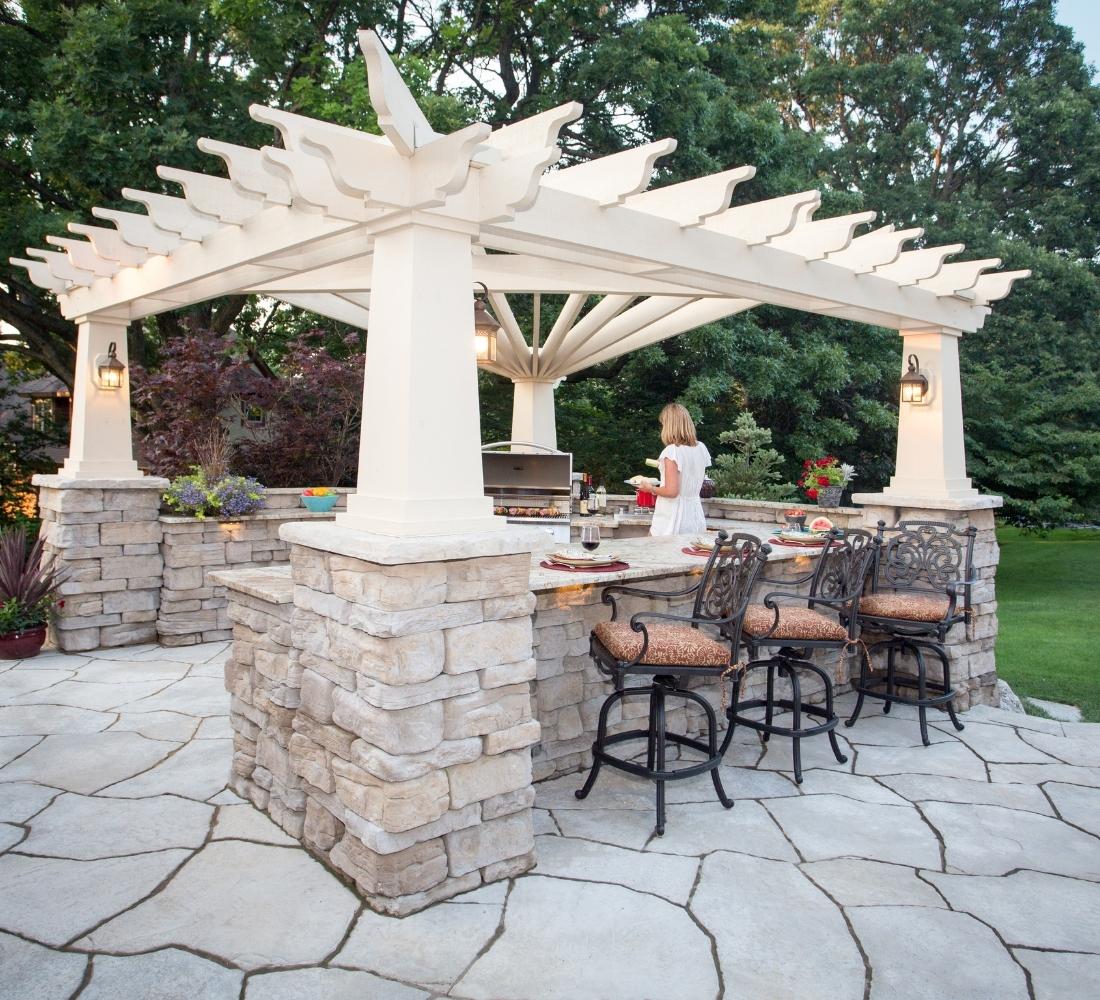 outdoor stone patio with pergola