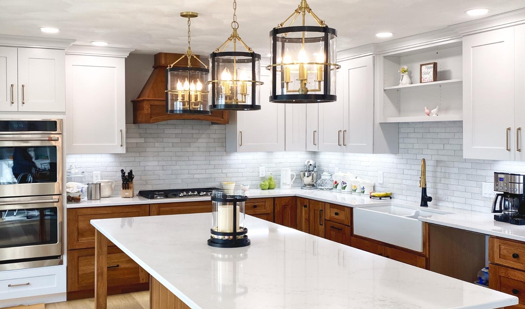 kitchen design with island, quartz countertop, and subway tile backsplash