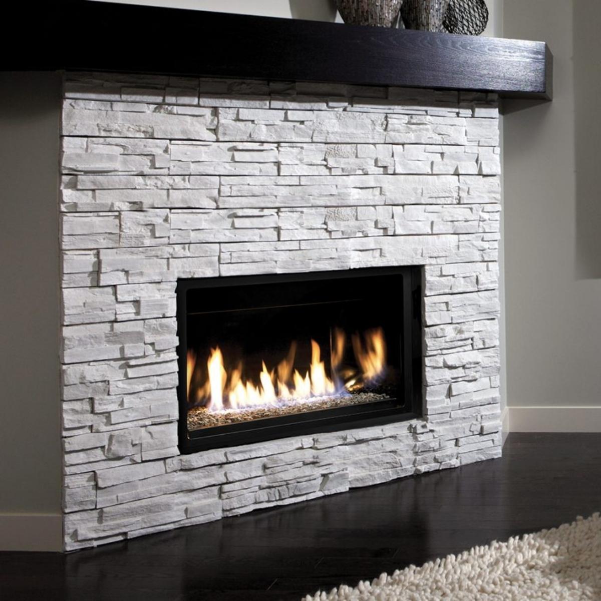 grey stone tile facing on gas fireplace