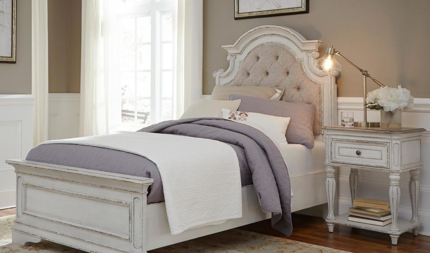 child's twin bed with upholstered headboard