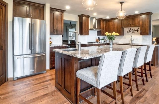 brown stained wood kitchen design with hardwood floors