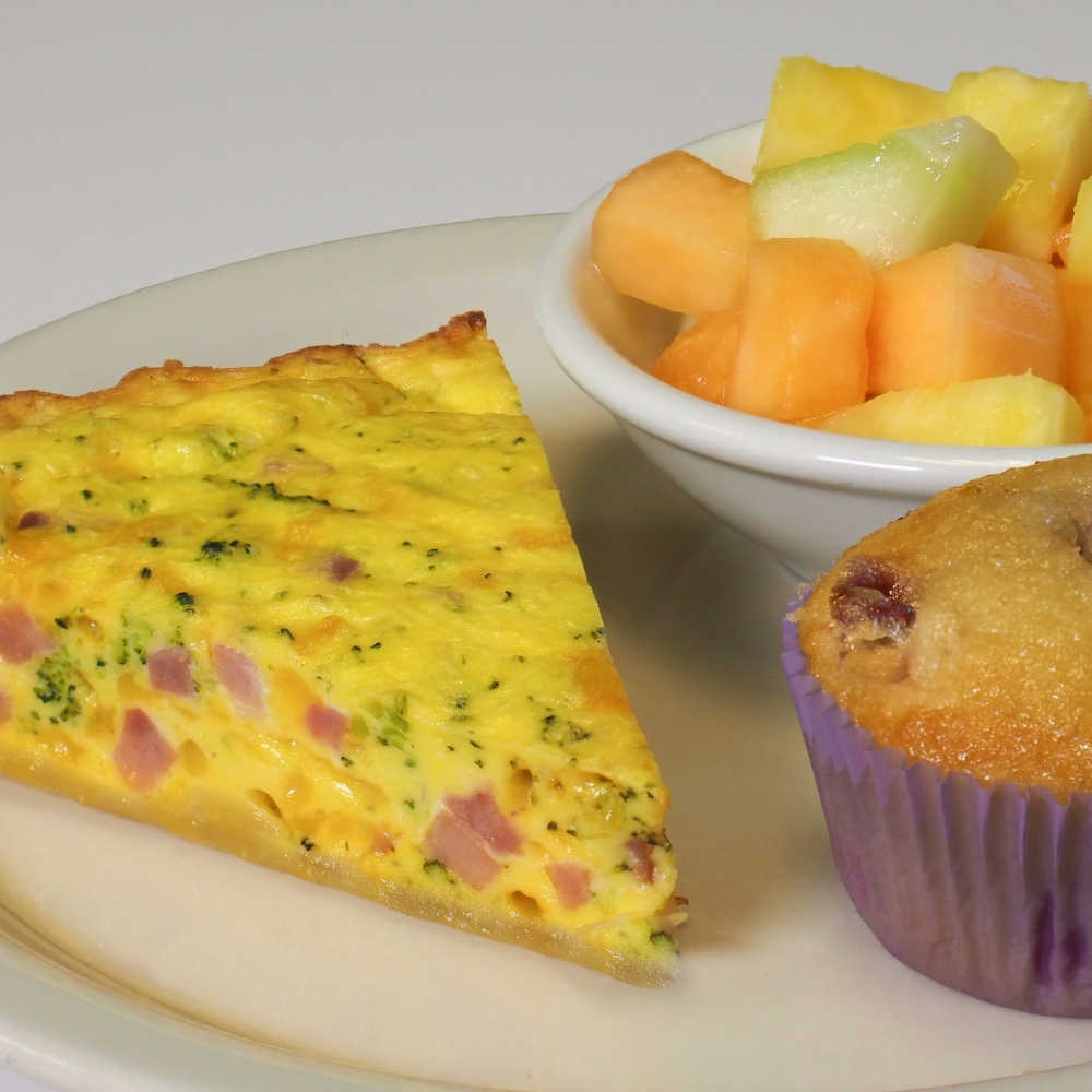 quiche, fruit, and muffin plate at hearthrock cafe in rockford, il