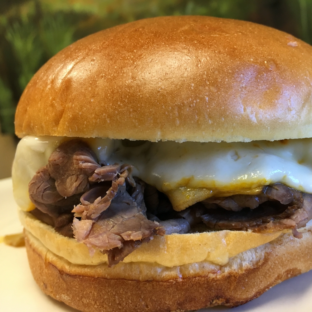 mushroom muenster roast beef sandwich on a bun at cafe in rockford ,il
