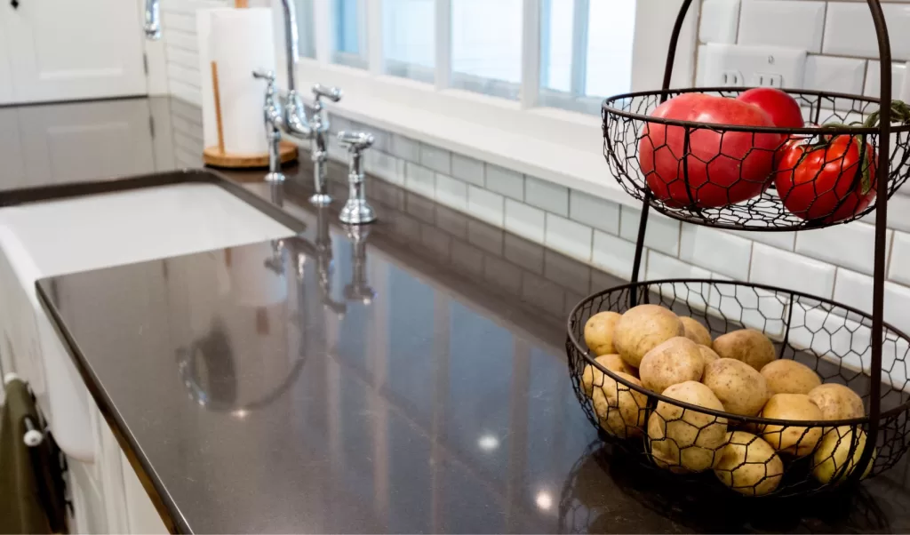 black stone countertop in a farmhouse kitchen