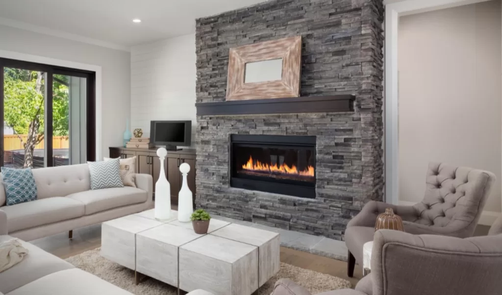 grey stone tile fireplace remodel project