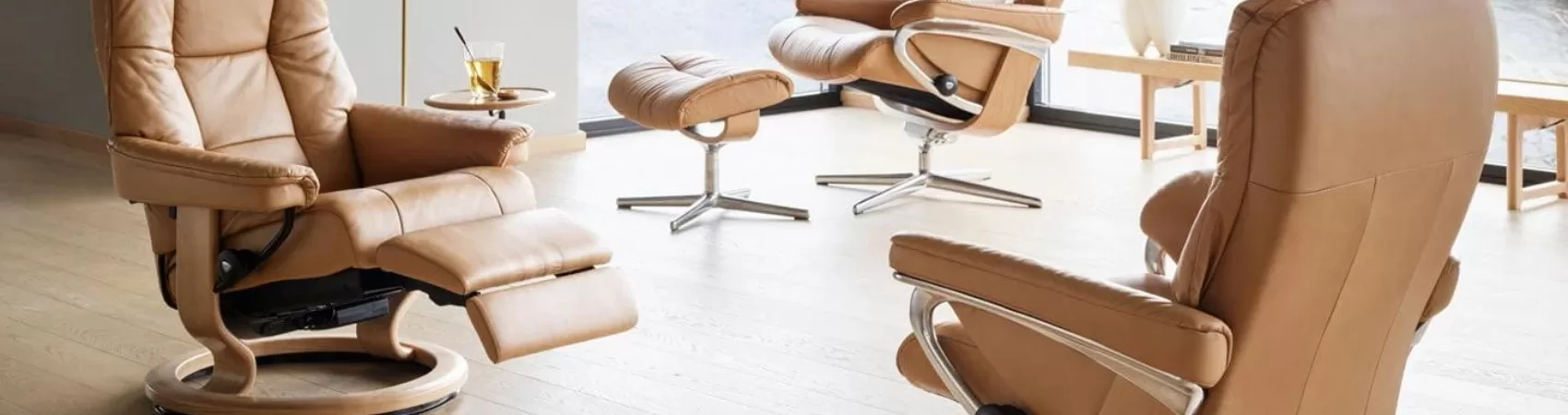 a variety of stressless furniture recliners showing different base options